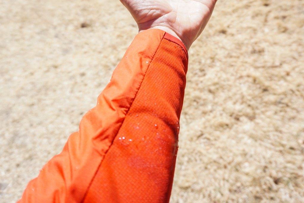 arc'teryx procline hybrid hoody - the tyono shell fabric sheds water, but the fleece panels soak it...