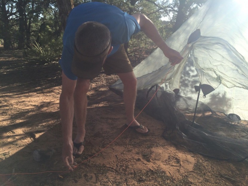 zpacks hexamid solo - holding the single pole at the optimal angle while also reaching out...