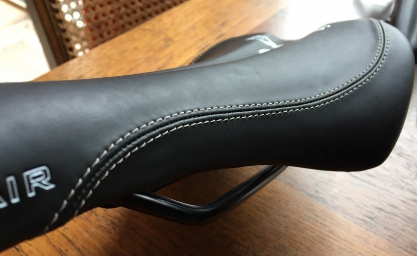 sdg components bel-air rl steel - the exposed stitching on the seat cover of the bel air steel.