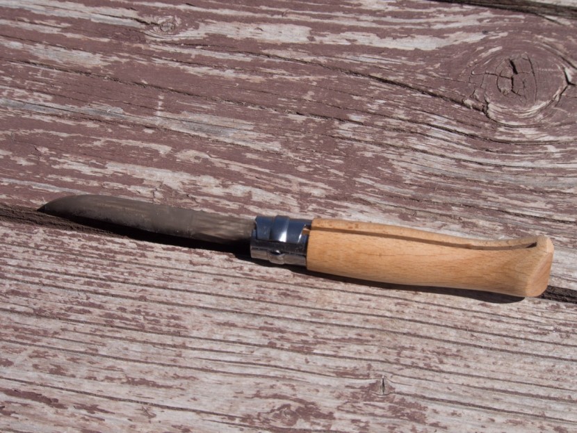 this image shows the locked configuration of the opinel. the silver...