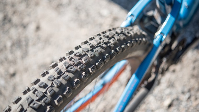 the maxxis aggressor rear tire rolls fast but still offers solid...