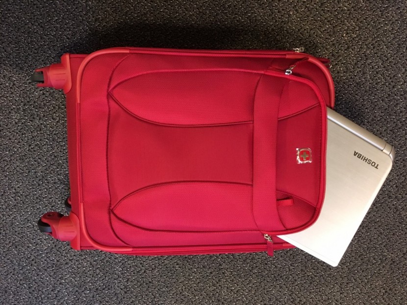 swissgear 7208 expandable liteweight spinner - this model has two exterior pockets for easy access to laptops and...