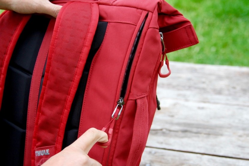 the additional side-access pocket provides direct access to the...