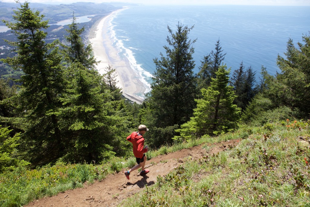 smartwool phd ultra light sport hoody - running in the chilly coastal wind on a peak above nehalem bay, or.