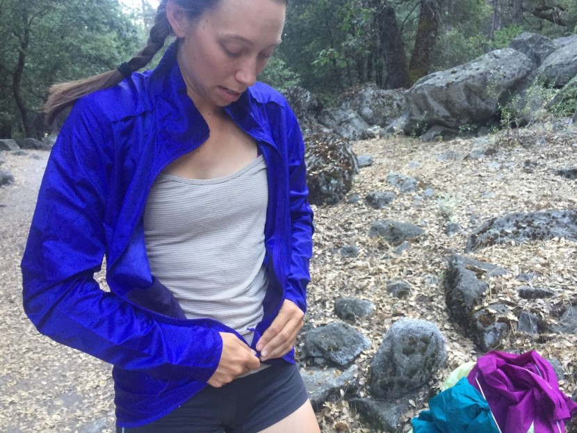 salomon agile for women - zipping up the heavier agile during our breathability test.