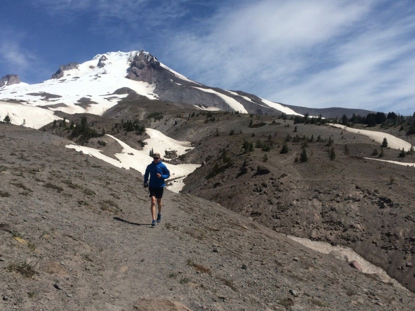 trail running shoes men - running on the pacific crest trail in front of where people ski in...
