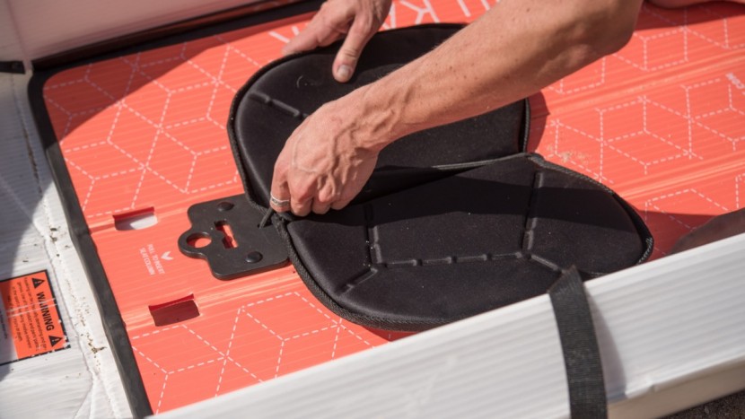 oru beach lt - a thin but comfortable seat attaches easily to the floor of the oru.