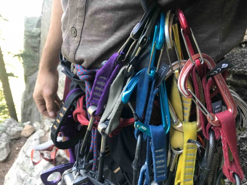 black diamond neutrino - a well-used red neutrino racked on a red camalot. these carabiners...