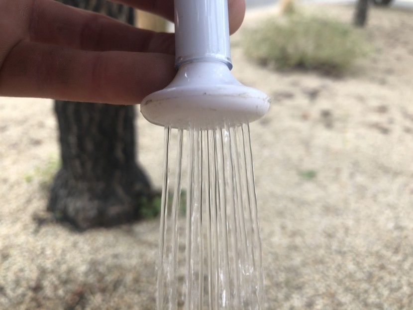 coghlan's 5-gallon - a narrow shower head limits the coverage of this shower.