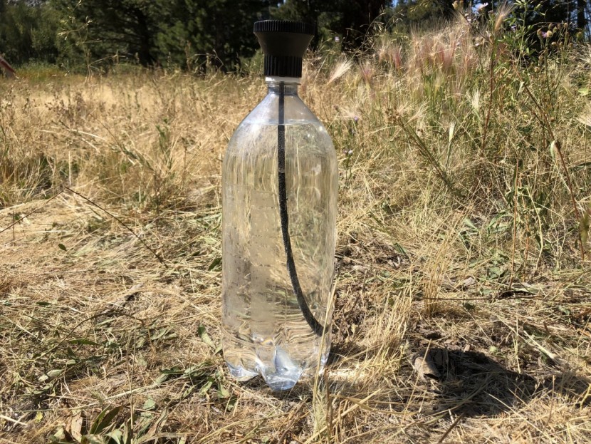 simple shower - the middle straw brings air back into the bottle, eliminating the...