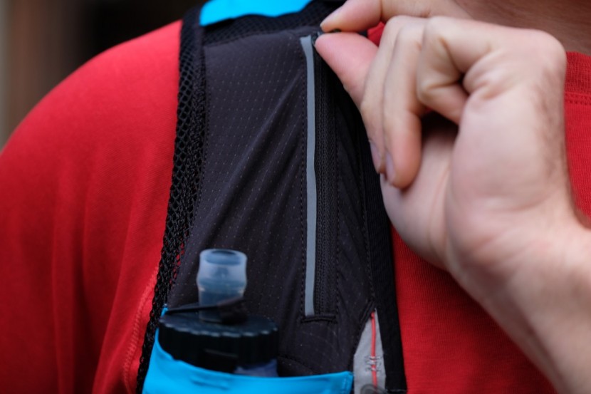 capable of holding a key or even a gel or two, the upper zipper...