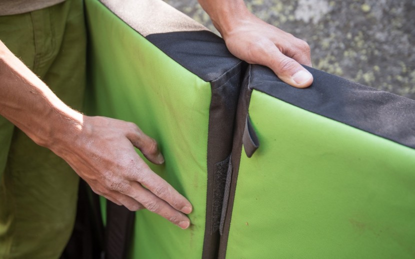 bouldering crash pad - this pad's angled hinge worked well on even landings, but without a...