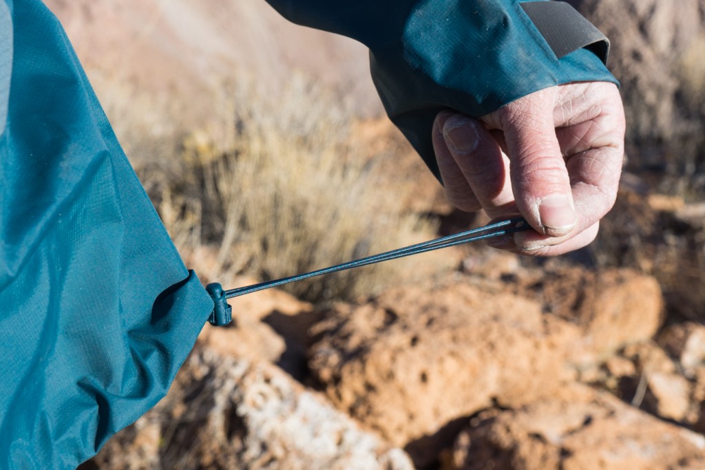 rei co-op stormbolt gtx - the hem cinch does a nice job sealing in the heat, but you'll need...