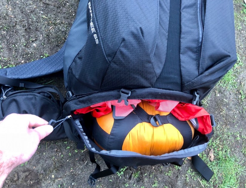 the north face banchee 65 - this is the lower sleeping bag access point. it has an optional...