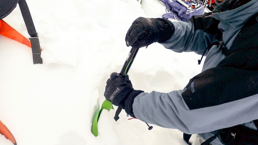 marmot ultimate - the marmot ultimate ski glove being used during a column test. while...