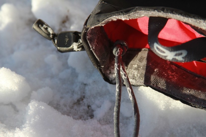 outdoor research alti mitt for women - a look at the removable leashes that fit nicely over bulky layers.