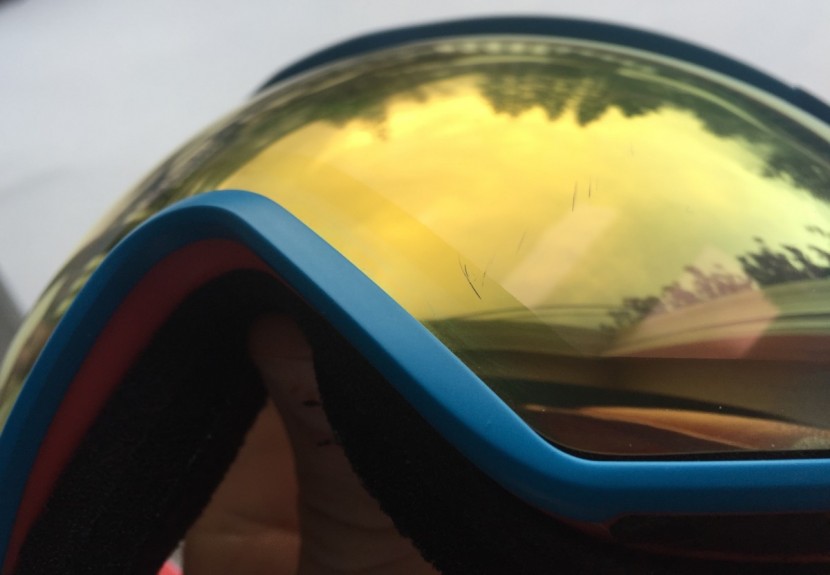ski goggles - inspecting the damage done to the lens of the julbo aeropace after a...