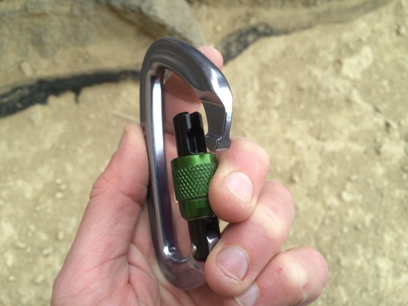 black diamond positron - locking and unlocking simply means screwing or unscrewing the gate...