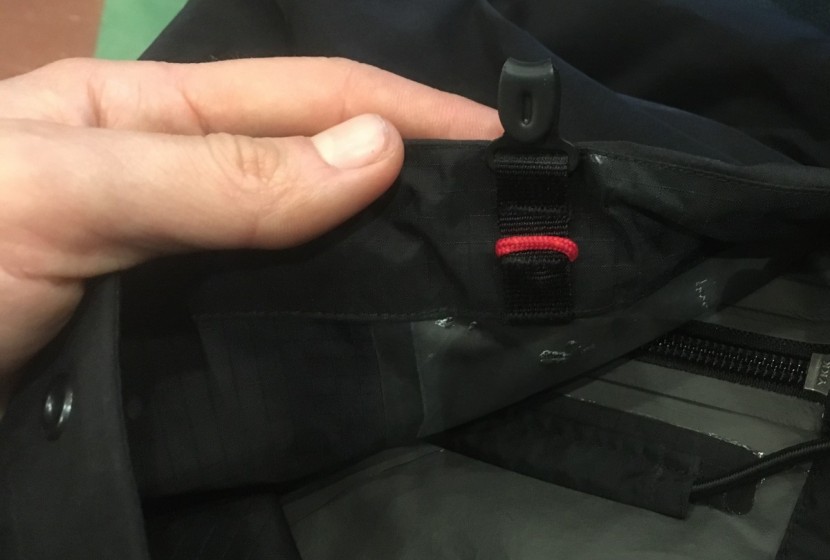 arc'teryx alpha sl pant for women - this hook attaches to your shoelaces to keep the bottom cuff secure...