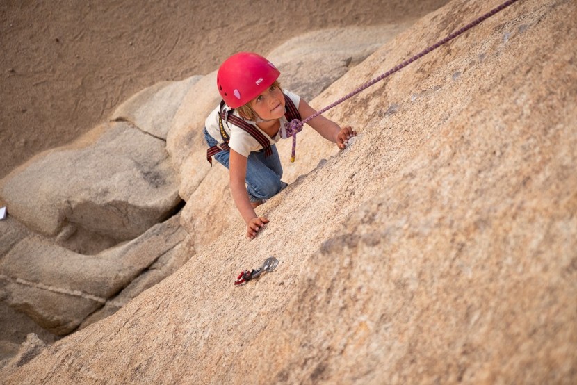 trango junior - a tester using the trango junior ascends a row of protrusions.