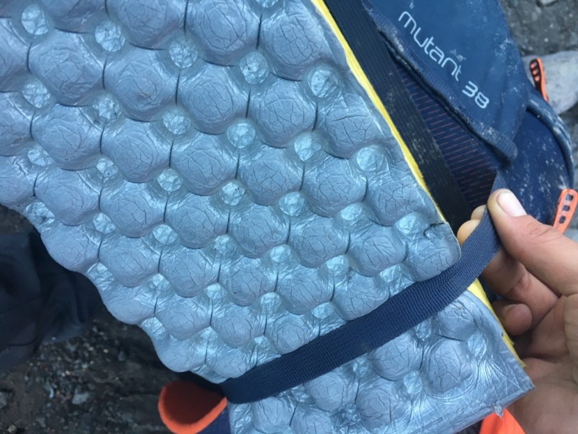 osprey mutant 38 - we like the switch to simple dual side straps. the bottom strap...