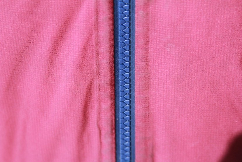 patagonia micro puff storm for women - the main zipper is burly, offering water resistance.