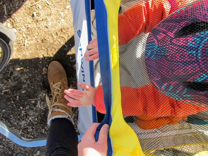 bike trailer - since it's only secured by velcro, a squirmy passenger can easily...