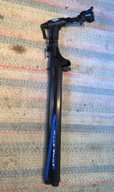 with the clamp arm attached, it is awkwardly shaped and 15 inches...