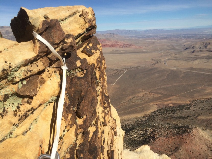 climbing slings - the petzl pur'anneau sling tied with a slip knot around a large...