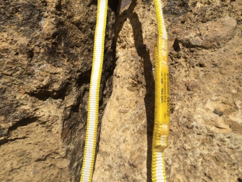 sterling dyneema sling - this sling is 10mm wide and supple. the white fibers shown here are...