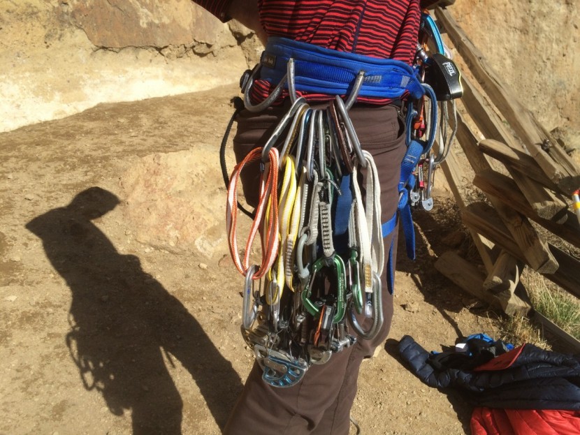 climbing slings - with the perfect rack all placed in order on his harness, including...
