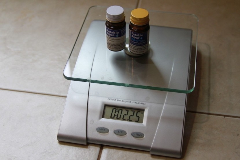 potable aqua purification tablets - a look at the relative weight of both jars when carried together.