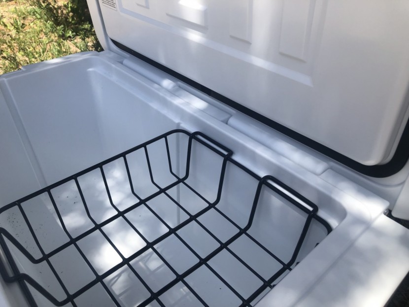 yeti tundra 65 - the tundra includes a handy but simple dry storage basket.