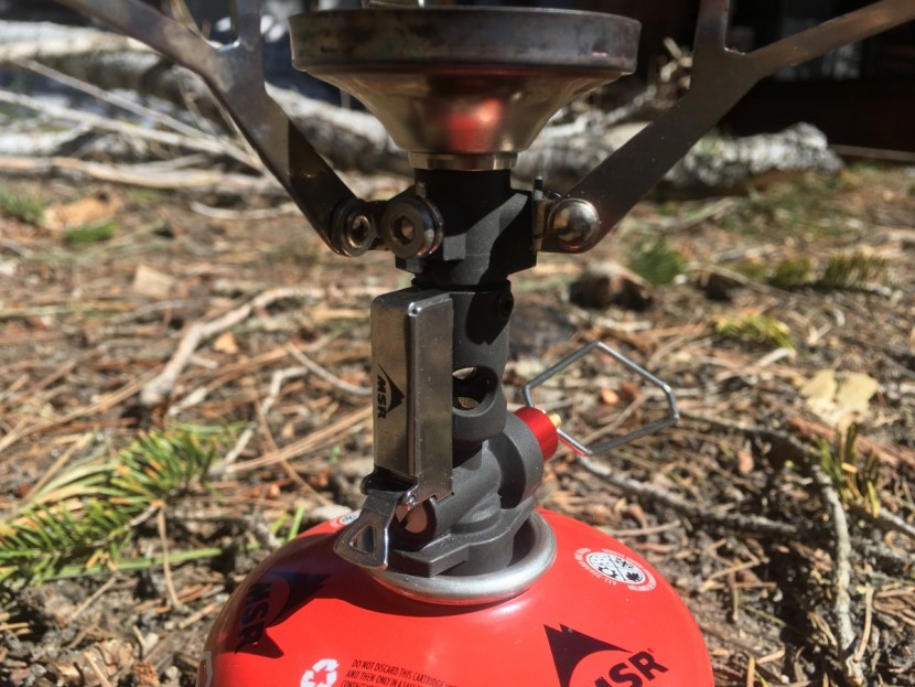 msr pocketrocket deluxe - the piezo igniter is protected in this metal housing, and the wire...