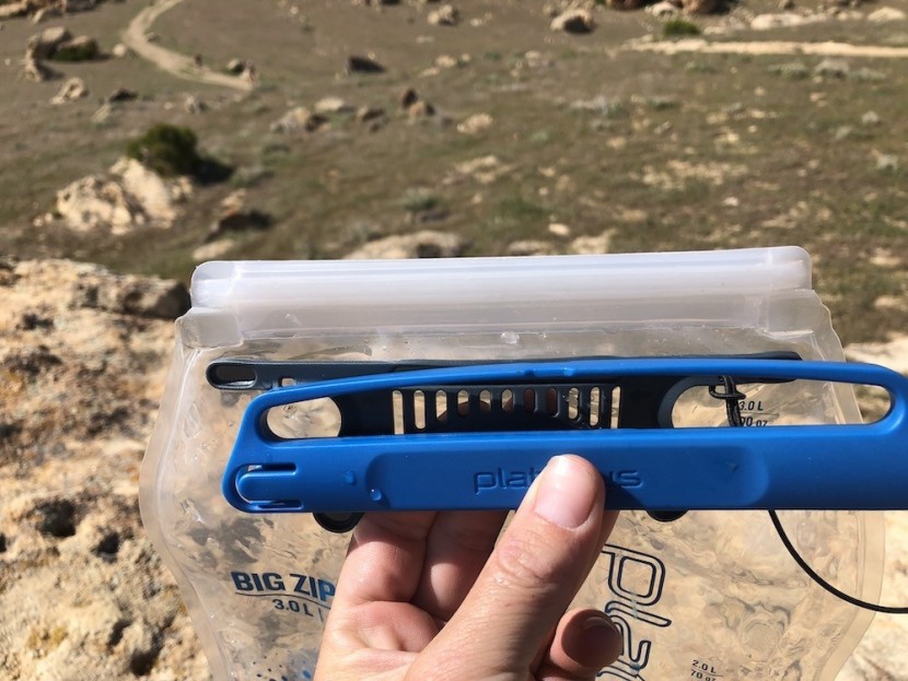 hydration bladder - a look at the ziptop closure with the complementary slide top for...