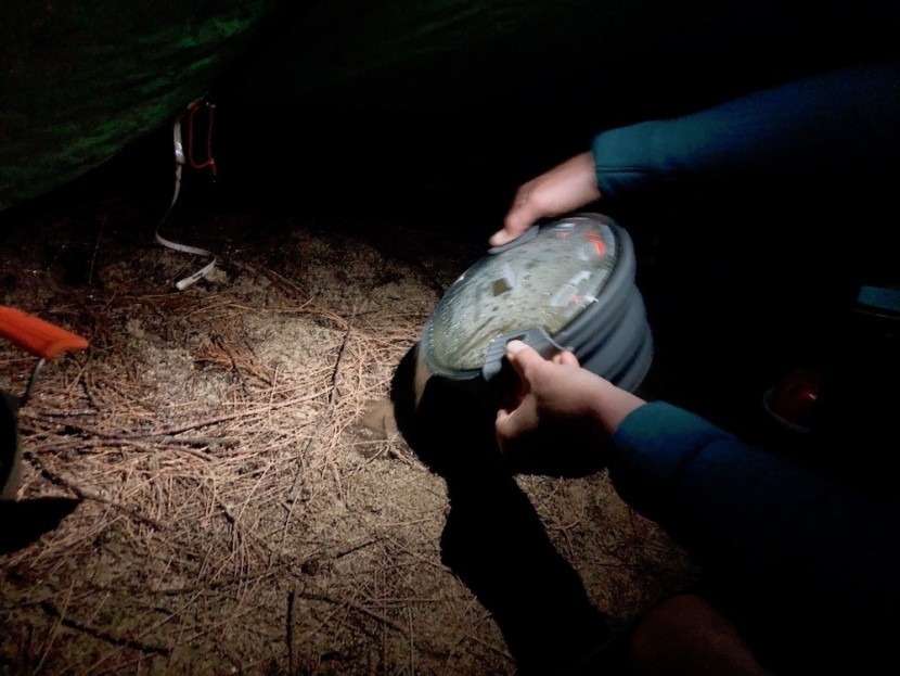 sea to summit x set 32 - straining some water through the built-in stainer on the lid.