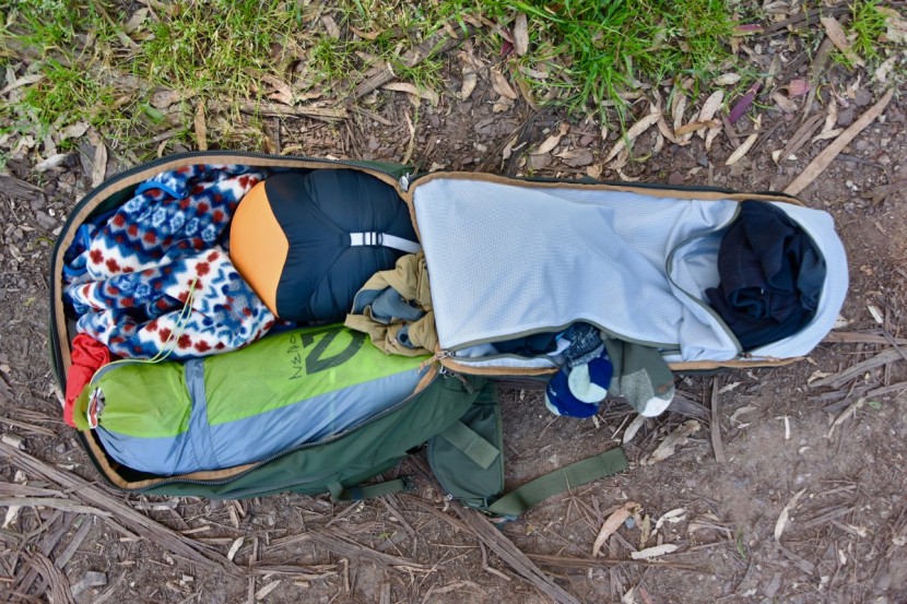 rei co-op ruckpack 65 - a u-shaped zipper allows the entire back of the pack to open. this...