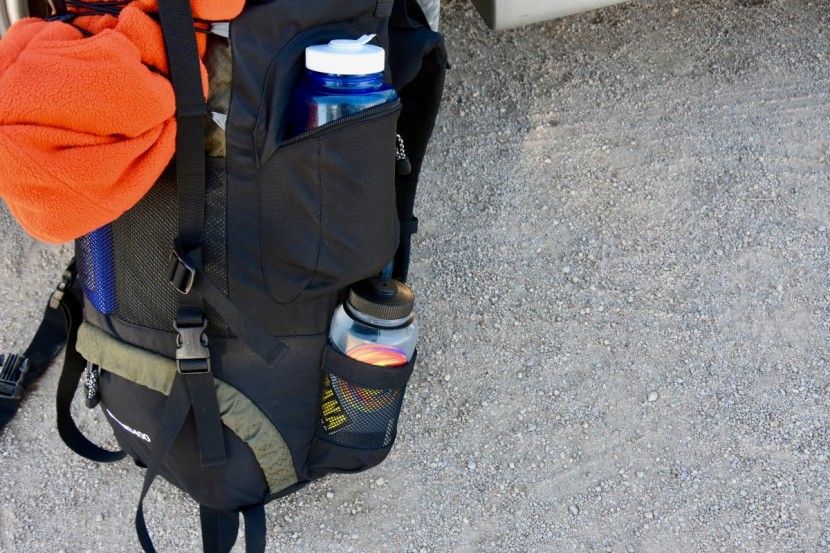 teton sports scout 3400 - each of the side pockets can fit a 1-liter nalgene, but just barely...