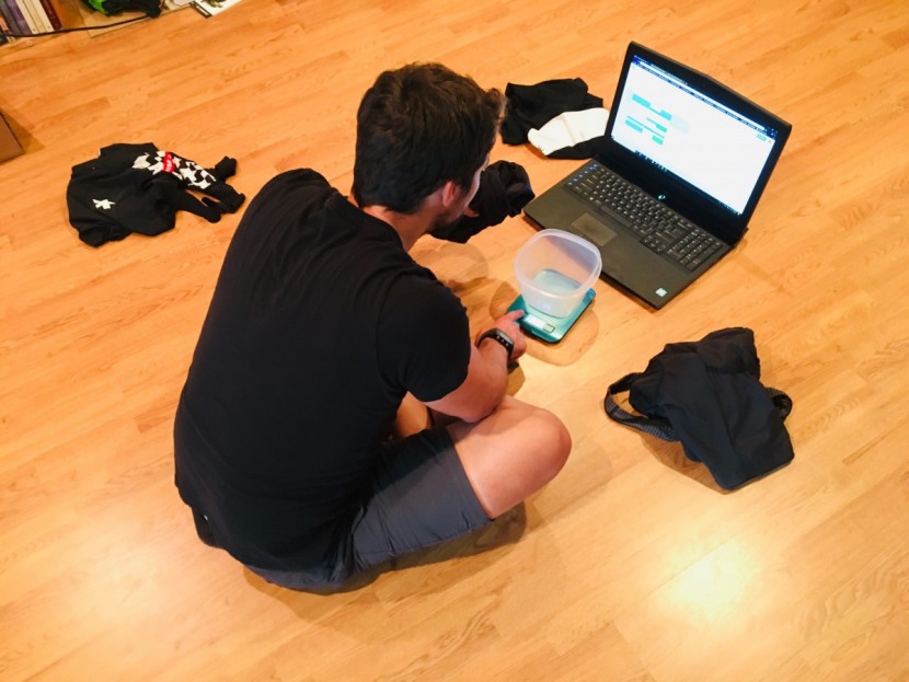bike shorts men - our reviewer is seen here equalizing a scale before weighing bib...