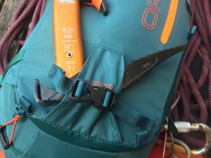 ortovox peak light 32l - with an adze or hammer, it is easy to secure an axe or piolet to the...