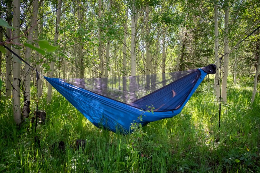 hammock - cocooned in a swath of fabric, we prefer to hang the head end lower...