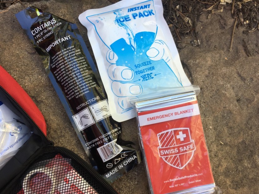 first aid kit - some of the extraneous items that could be useful for the car or...