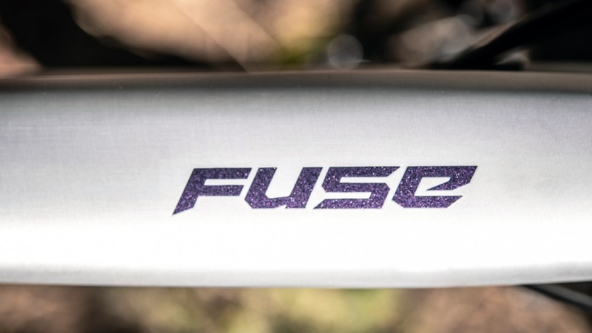 specialized fuse expert 29 - the clean brushed aluminum frame is interrupted by some sparkly...