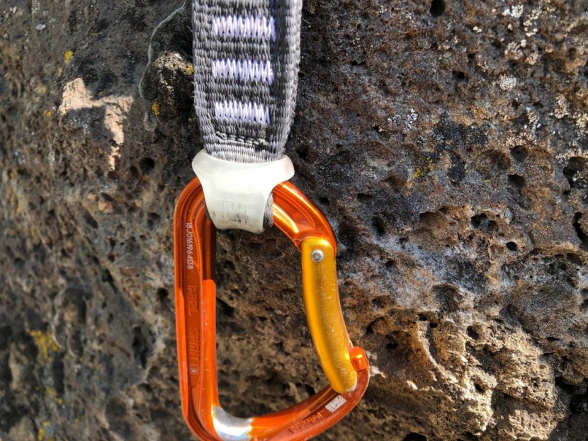 petzl spirit express - the petzl string is the white rubberized piece that keeps the bottom...