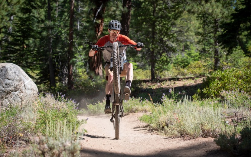 kona process 153 cr 27.5 - it's long and slack, but the short chainstays make the rear end feel...