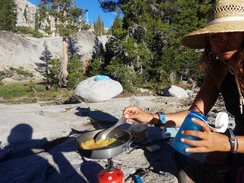 light my fire titanium - one of the authors, sara, cooks up some eggs and veggies in...