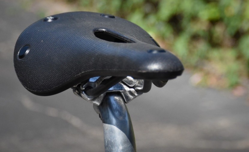 the firm, unpadded seating platform and the abrupt pressure relief...