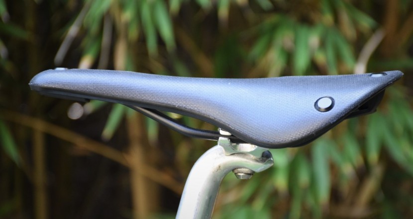 the firm, unpadded seating platform and the abrupt pressure relief...