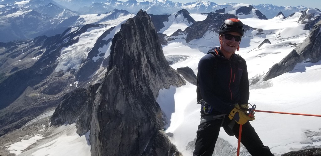 dmm rhino - descending off the summit of bugaboo spire via rappel, with...