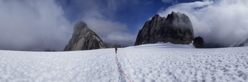 mammut revelation - dragging the rope through the melting snow on alpine glaciers is one...
